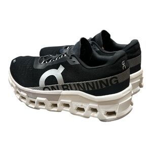 On Cloudmonster 2 running sneakers black and white (known as "Black/Frost" M7/W9